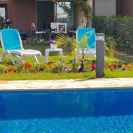 Appartement De Luxe Avec Jardin Vue Sur La Piscine Golf Securise 24H Sur 24 A 5 Minutes De L Aeroport 마라케시 외부 사진