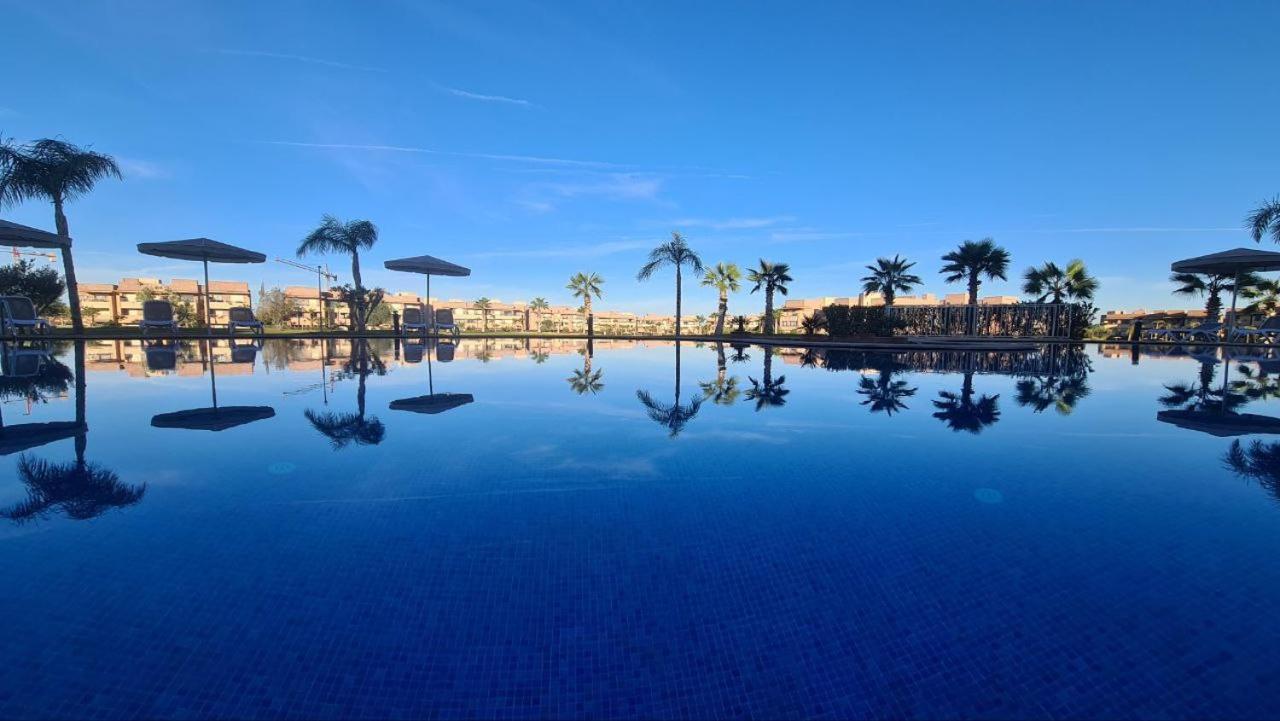 Appartement De Luxe Avec Jardin Vue Sur La Piscine Golf Securise 24H Sur 24 A 5 Minutes De L Aeroport 마라케시 외부 사진